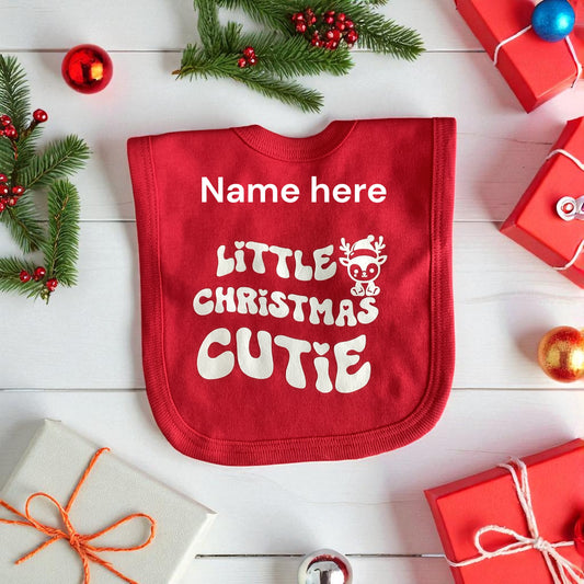 Christmas Baby Bib' Littie Christmas Cutie' can be personalised with name