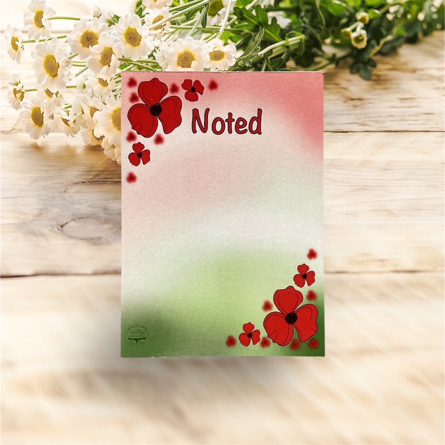 "A6 Poppy Notepad - Size Comparison - Compact Remembrance-Themed Stationery for On-the-Go Notes"