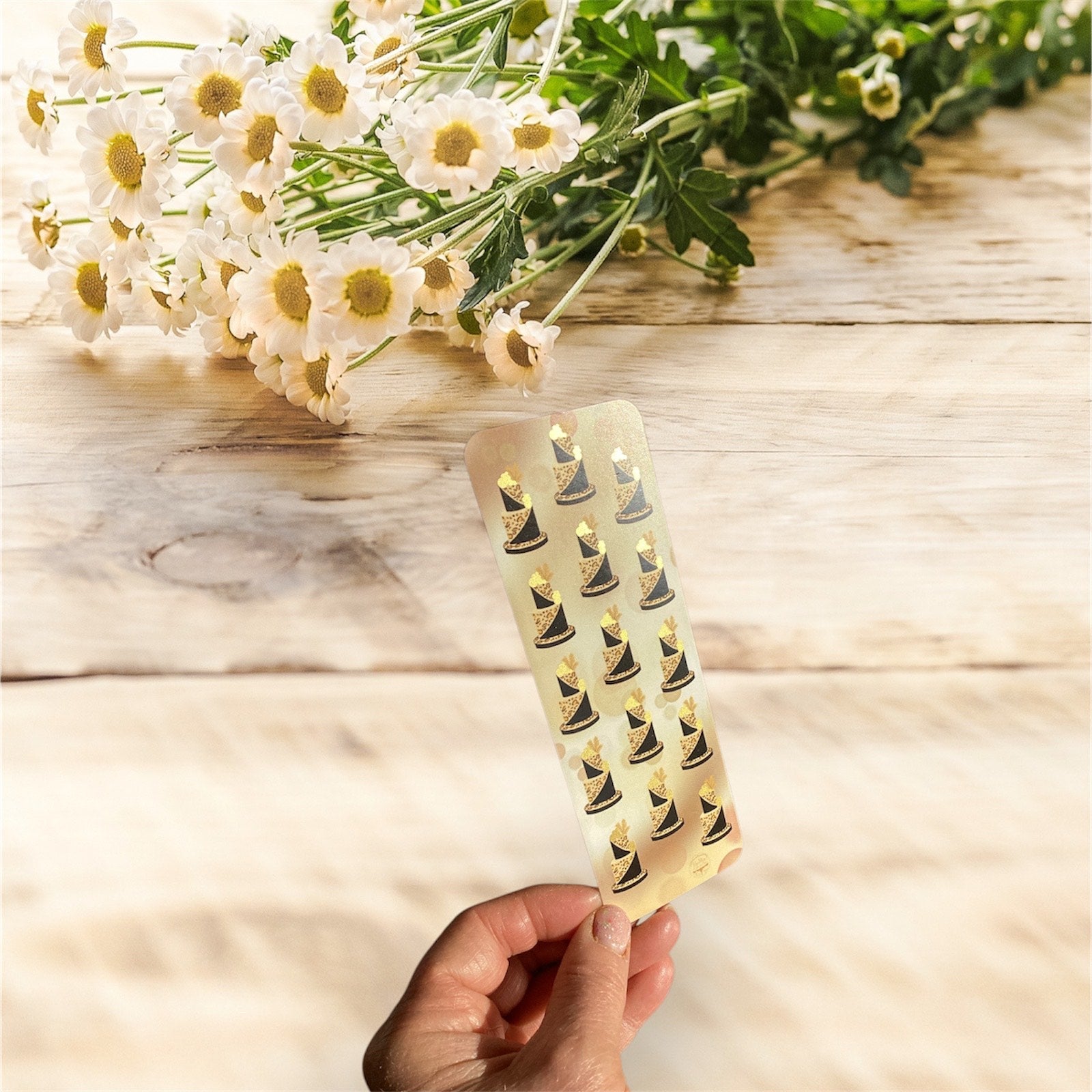 "Close-up of leopard print bookmark showing detailed black and gold pattern and premium finish"