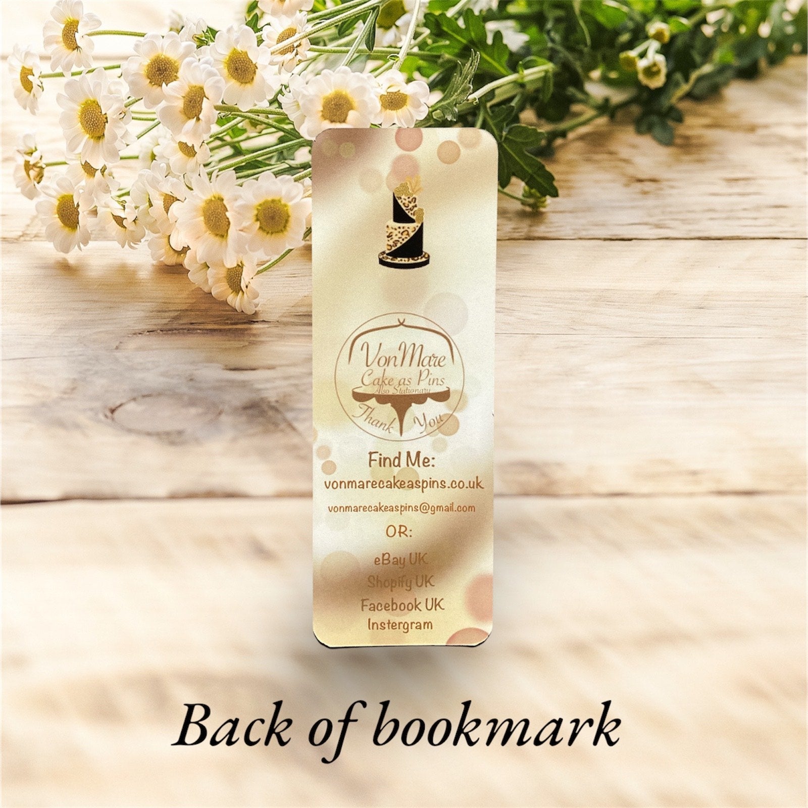 "Double-sided leopard print bookmark with gold accents, showing both front and back designs"