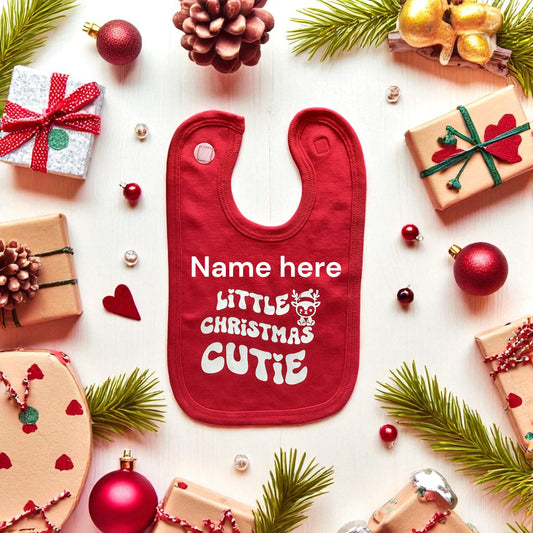 Christmas Baby Bib' Littie Christmas Cutie' can be personalised with name