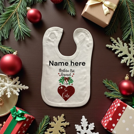 Christmas White baby bib with quote ' Mistletoe not required, I am SO CUTE' can be personalised