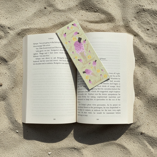 Open book on sand with Ice Cream bookmark