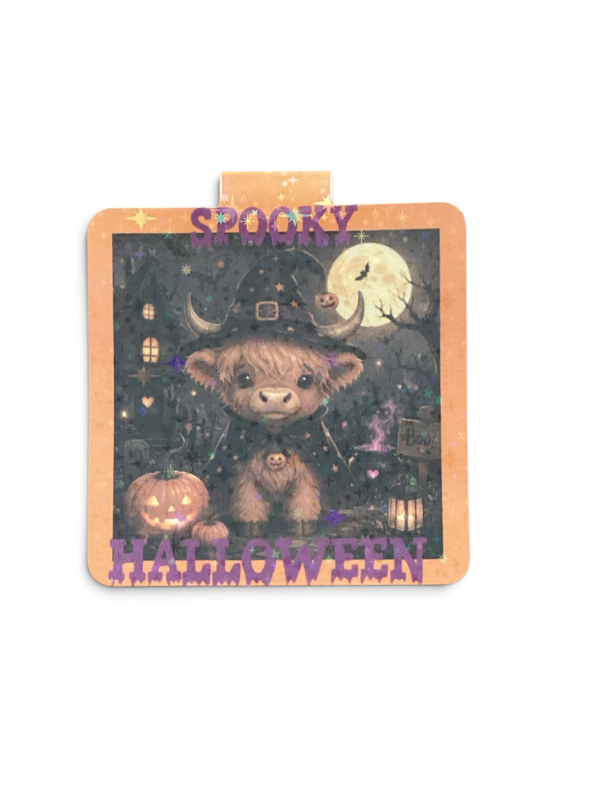 "Close-up of Highland Cow Halloween magnetic bookmark showing a cute witch cow with pumpkin, moon and spooky scene, with Spooky Halloween text on orange border"