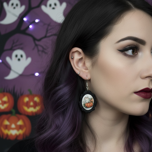  Handmade ghost and pumpkin framed polymer clay Halloween earrings with hypoallergenic silver-plated hooks
Image 2: Close-up of ghost and pump